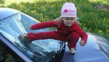 kid-kicks-windshield
