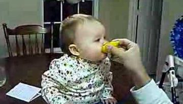 Baby Eats Sour Lemon
