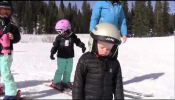 Boy Falls Asleep on Skis