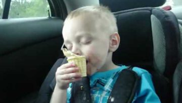 Sleepy Kid Eats Ice Cream