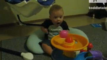 Baby is Surprised with New Toy   1Funny.com
