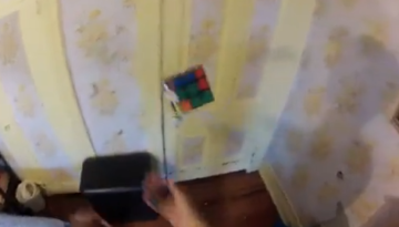 Solving a Rubik’s Cube while Juggling   1Funny.com