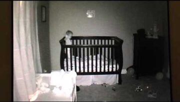 Baby Diving in Crib