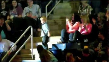 Boy Dancing at a Concert