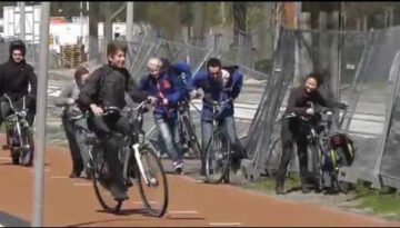 Strong Wind Blows Away Bikers