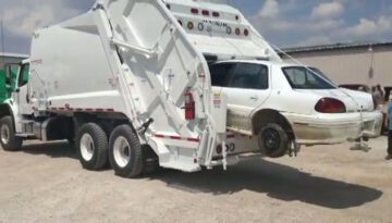 garbage_truck_compactor_crush_a_car thumbnail