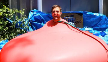 6ft Man in 6ft Giant Water Balloon – 4K – The Slow Mo Guys