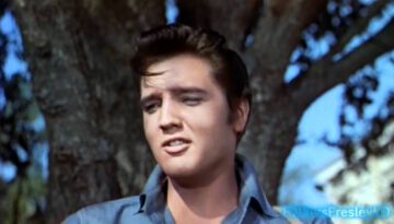 Elvis sings Gotta Lotta Living To Do