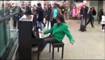 Guy Rocks Out Amazing Grace to a Crowd