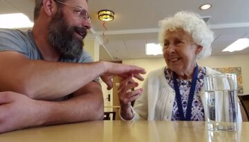 Guy Visiting His Grandmother with Alzheimer