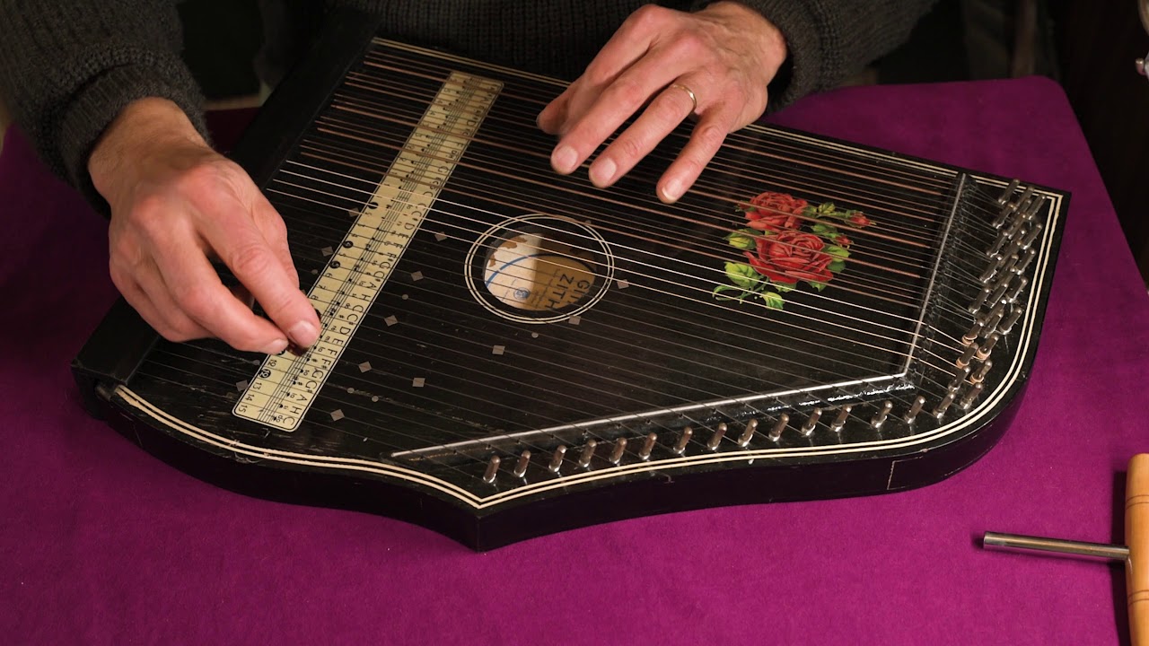 sounds-of-silence-on-a-5-chord-zither-1funny