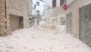 Sea Foam Covers Streets of Spanish Coastal Town