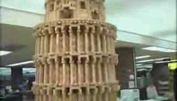 Clumsy Reporter Knocks Down Jenga Tower