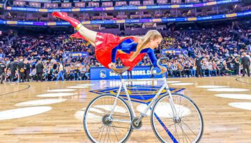 Supergirl on Bicycle