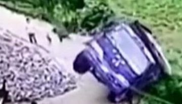 Man Jumps out of Truck Window Before It Falls off Cliff