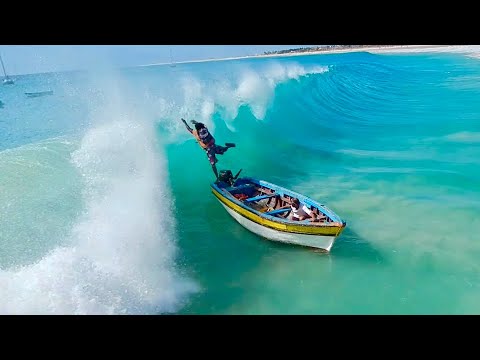 Massive Wave Takes Out Fishermen